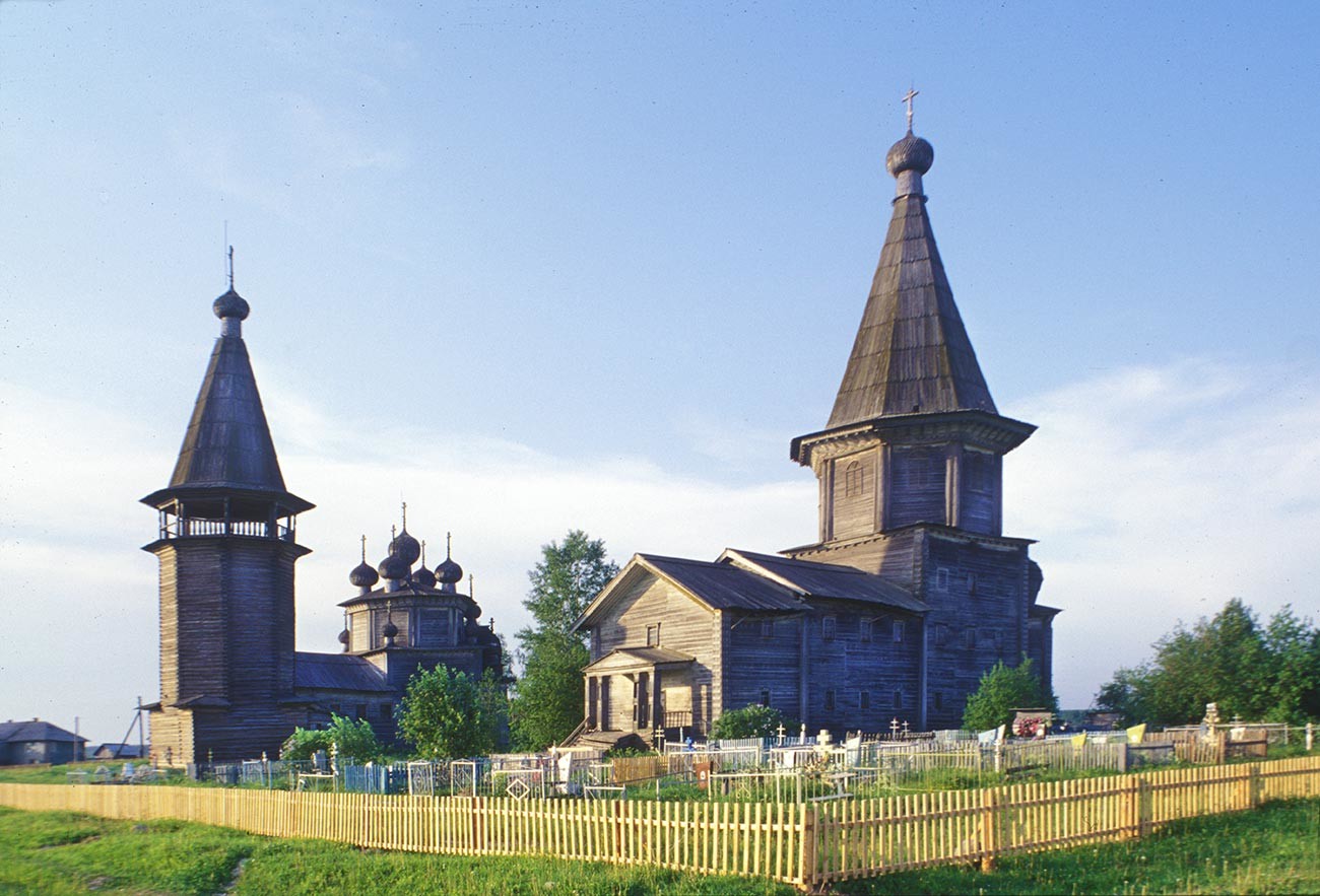 Lyadiny. From left: bell tower, Epiphany Church, Intercession Church with cemetery. Southwest view.  June 16, 1998