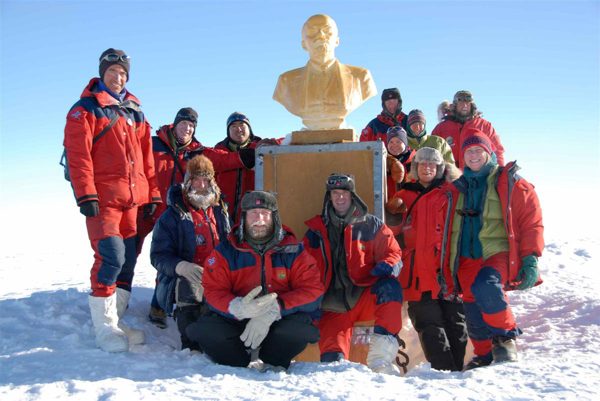 The Norwegian-US Traverse team poses with Lenin's bust.