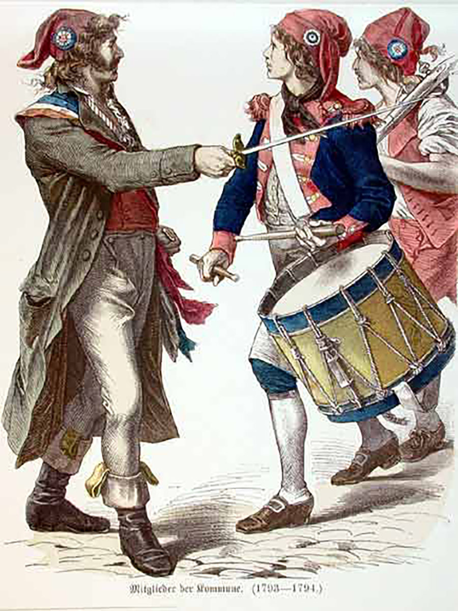 Revolucionarios franceses con gorro frigio y escarapela tricolor.
