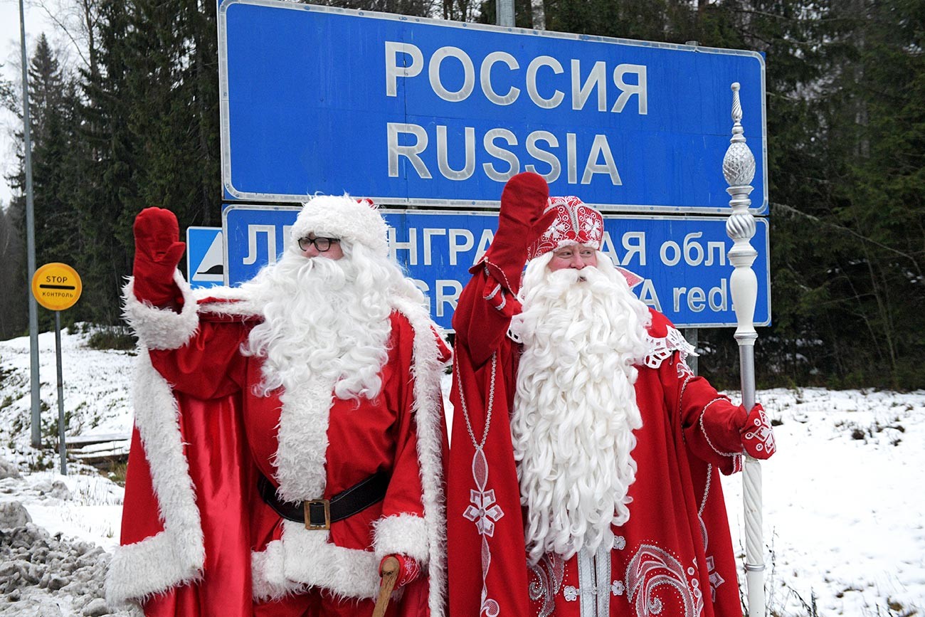 Russian and Finnish Santas on the Russian-Finnish border.
