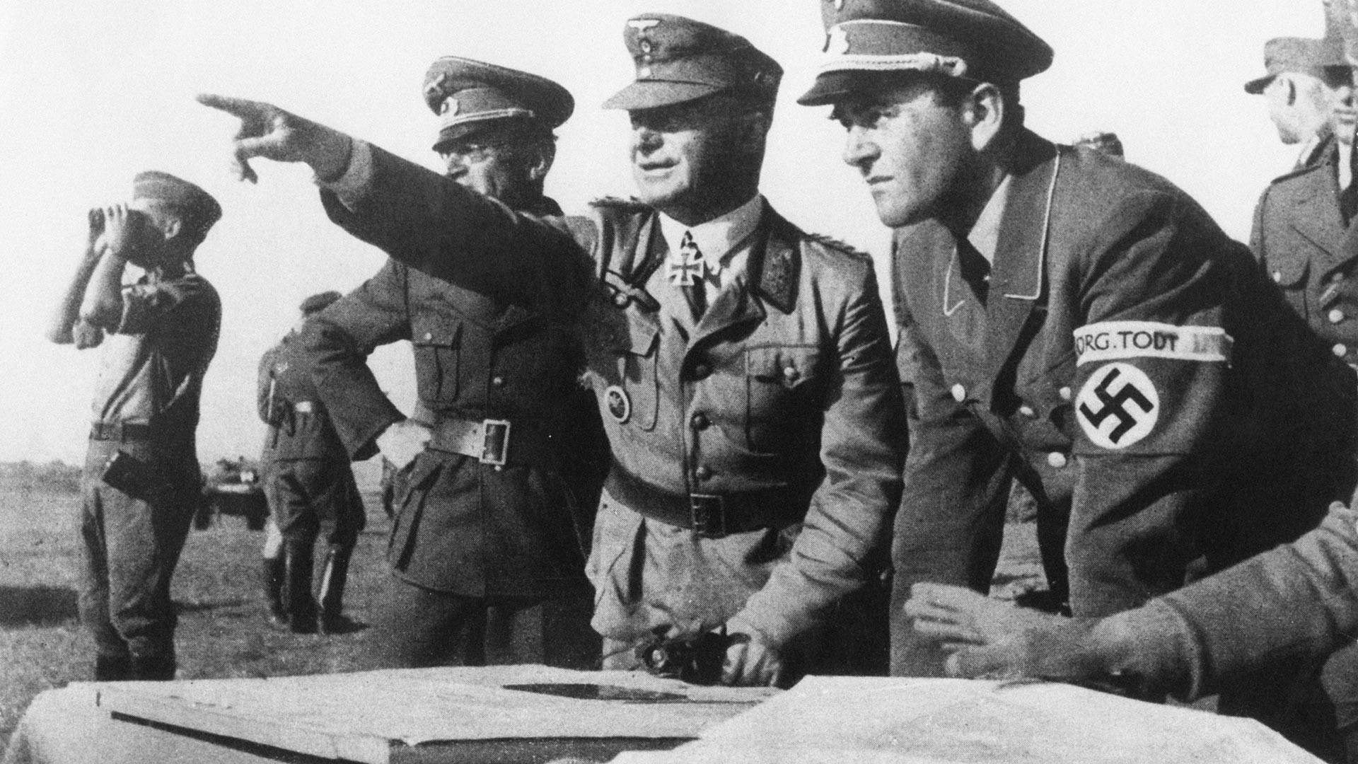 Albert Speer, German Minister of Armaments and War Production for the Third Reich, with officers of the Organisation Todt military engineering group on the Eastern Front, 1943.