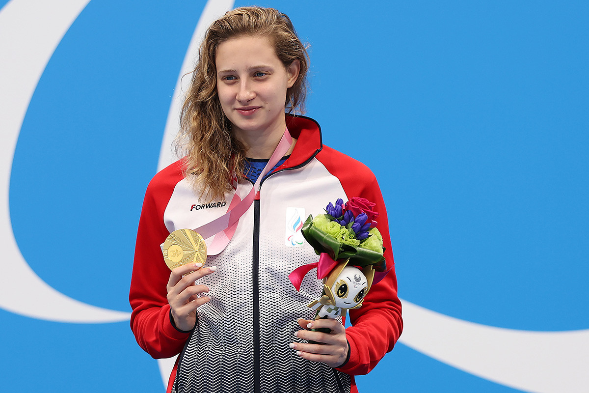 Valeriia Shabalina of Team Russian Paralympic Committee celebrates with the gold medal during the medal ceremony for the Women’s 200m Individual Medley - SM14 Final on day 7 of the Tokyo 2020 Paralympic Games at Tokyo Aquatics Centre on August 31, 2021 in Tokyo, Japan