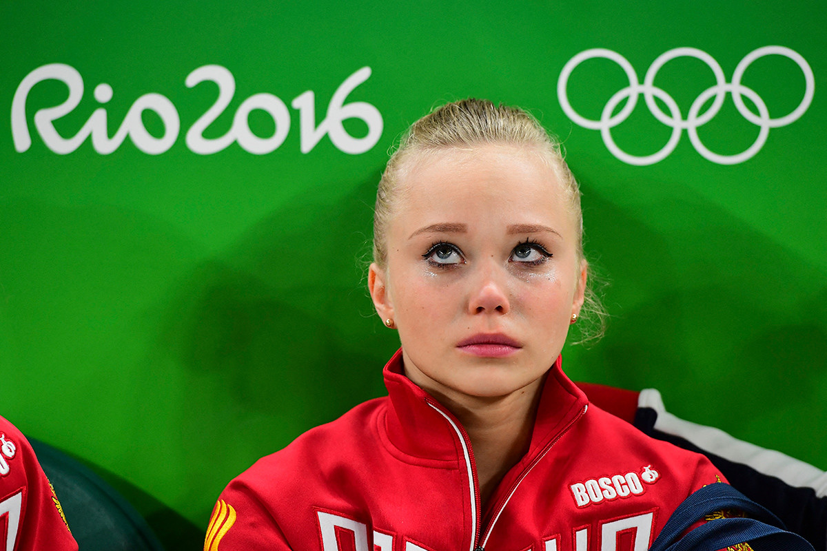 Russia's Angelina Melnikova reacts during the qualifying for the women's Artistic Gymnastics at the Olympic Arena during the Rio 2016 Olympic Games in Rio de Janeiro on August 7, 2016