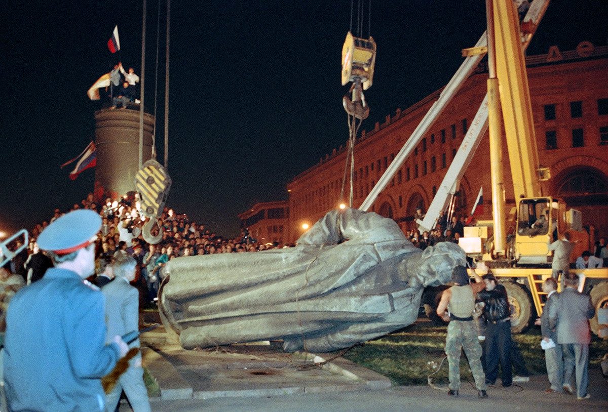 The statue of the founder of the KGB, Felix Dzerzhinsky, is toppled off its pedestal in front of KGB headquarters in Moscow, Russia, in August 1991.