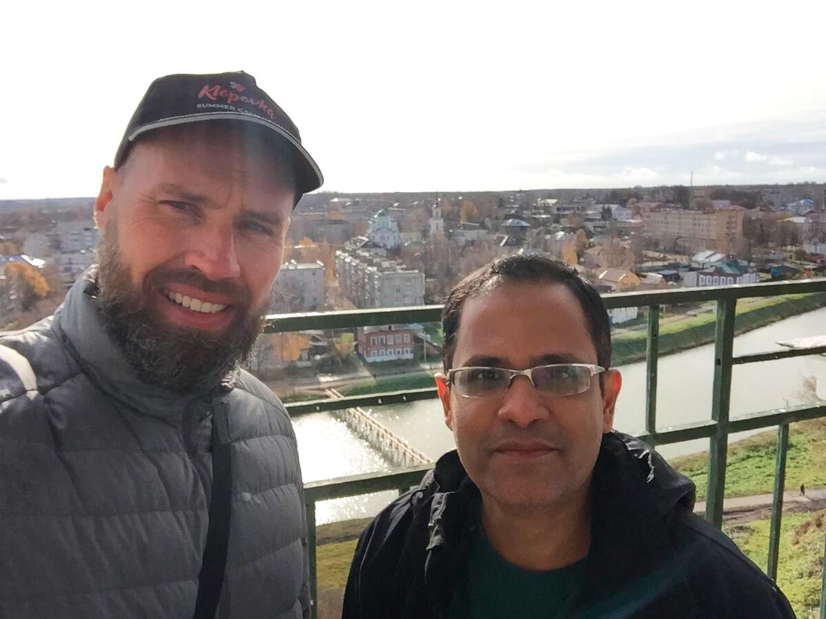Ajay and Victor are at the top of the bell tower of the Resurrection Cathedral. 