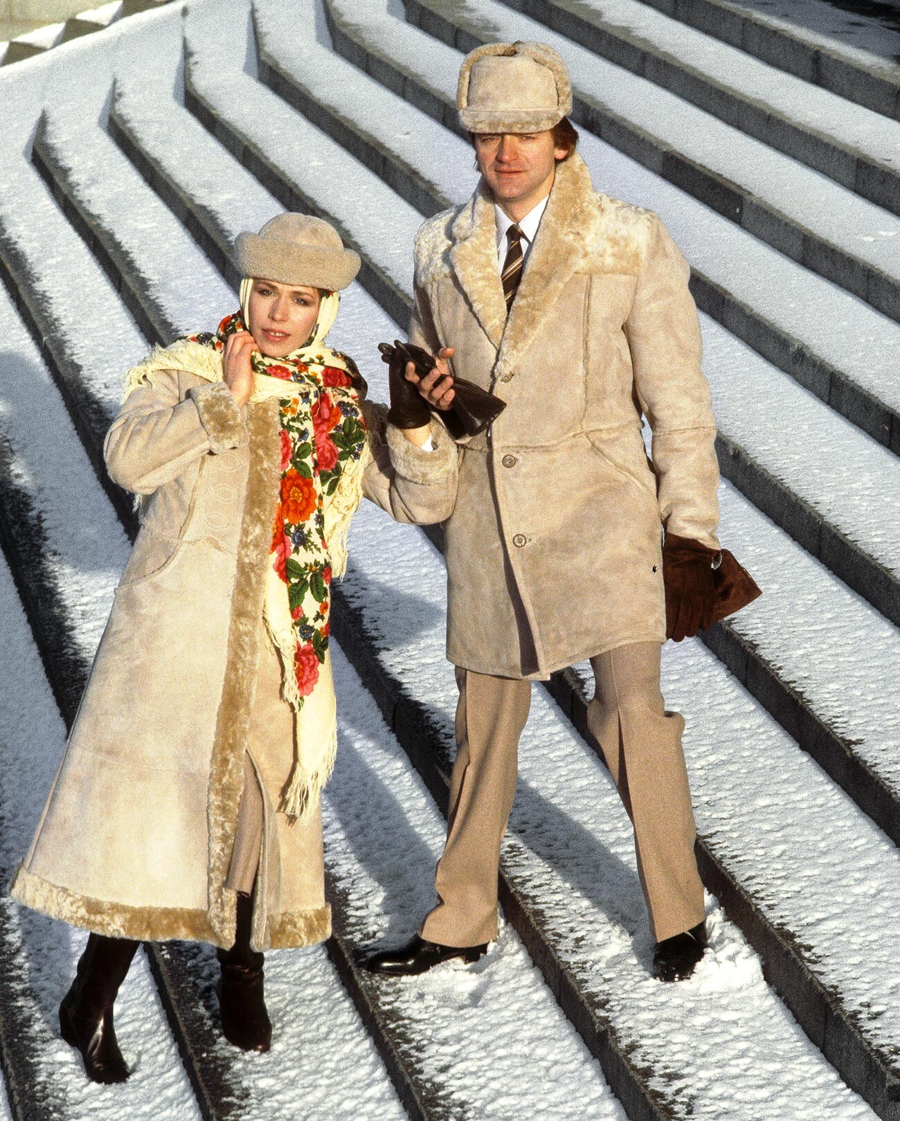Soviet people in winter coats.