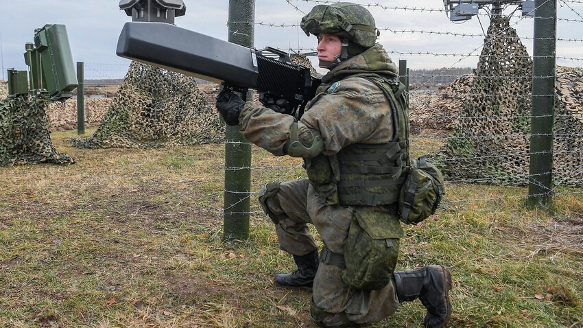 A Russian soldier with an anti-drone gun