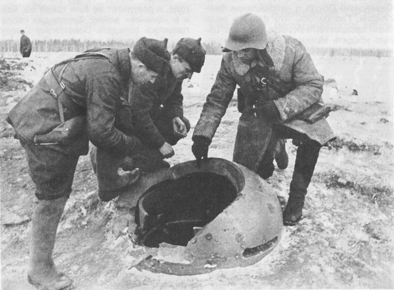 Soviet soldiers near the destroyed Finnish pillbox.