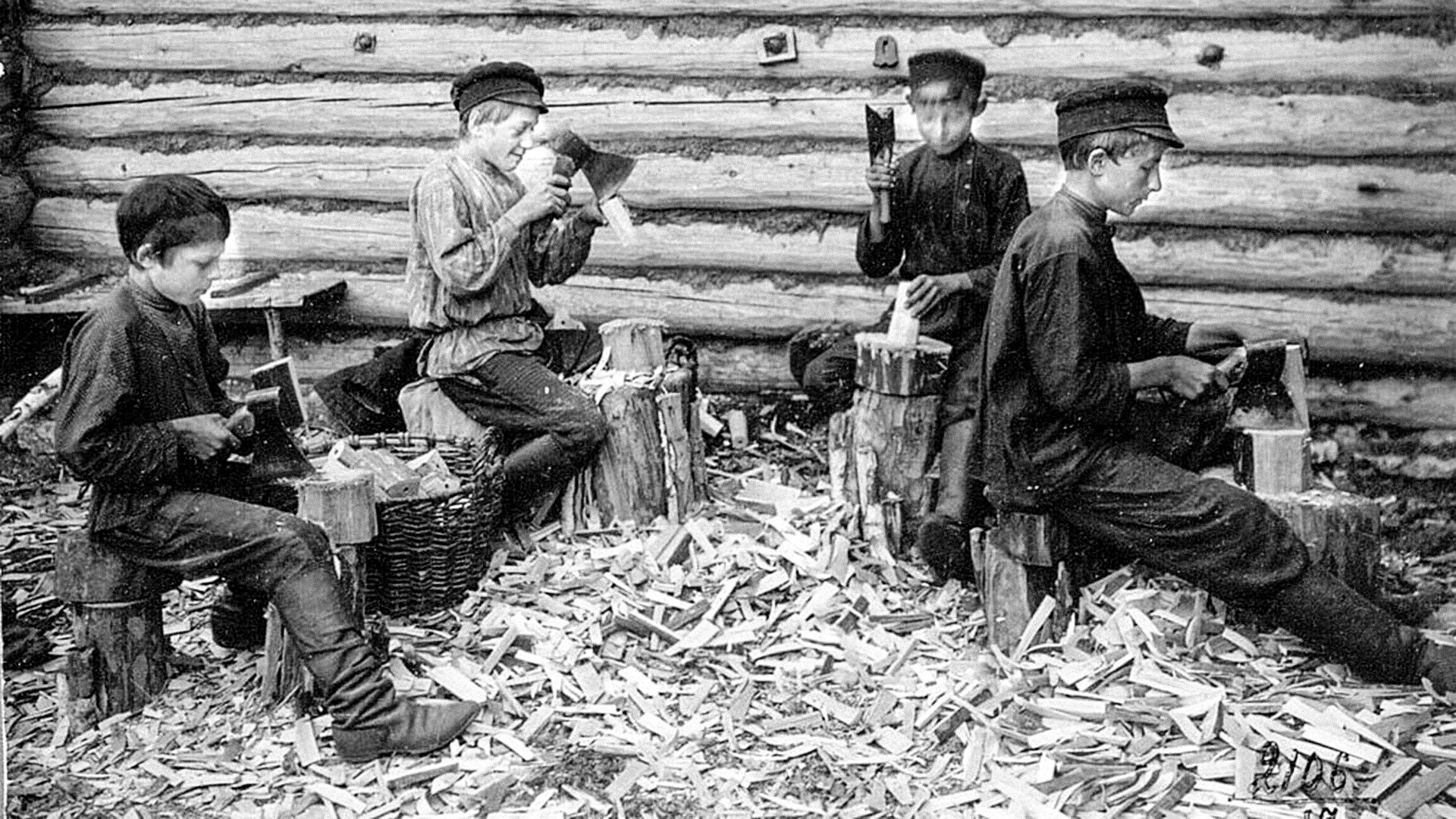 Children cutting wood in Ryazan, Russia.