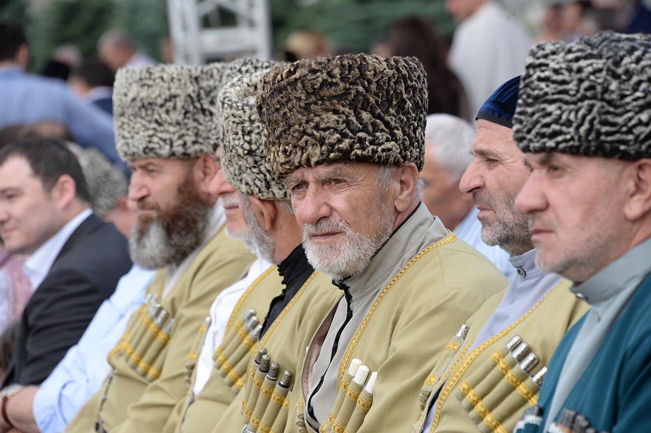 Ingush men in traditional dress during celebrations marking the 25th birthday of Russia's Republic of Ingushetia