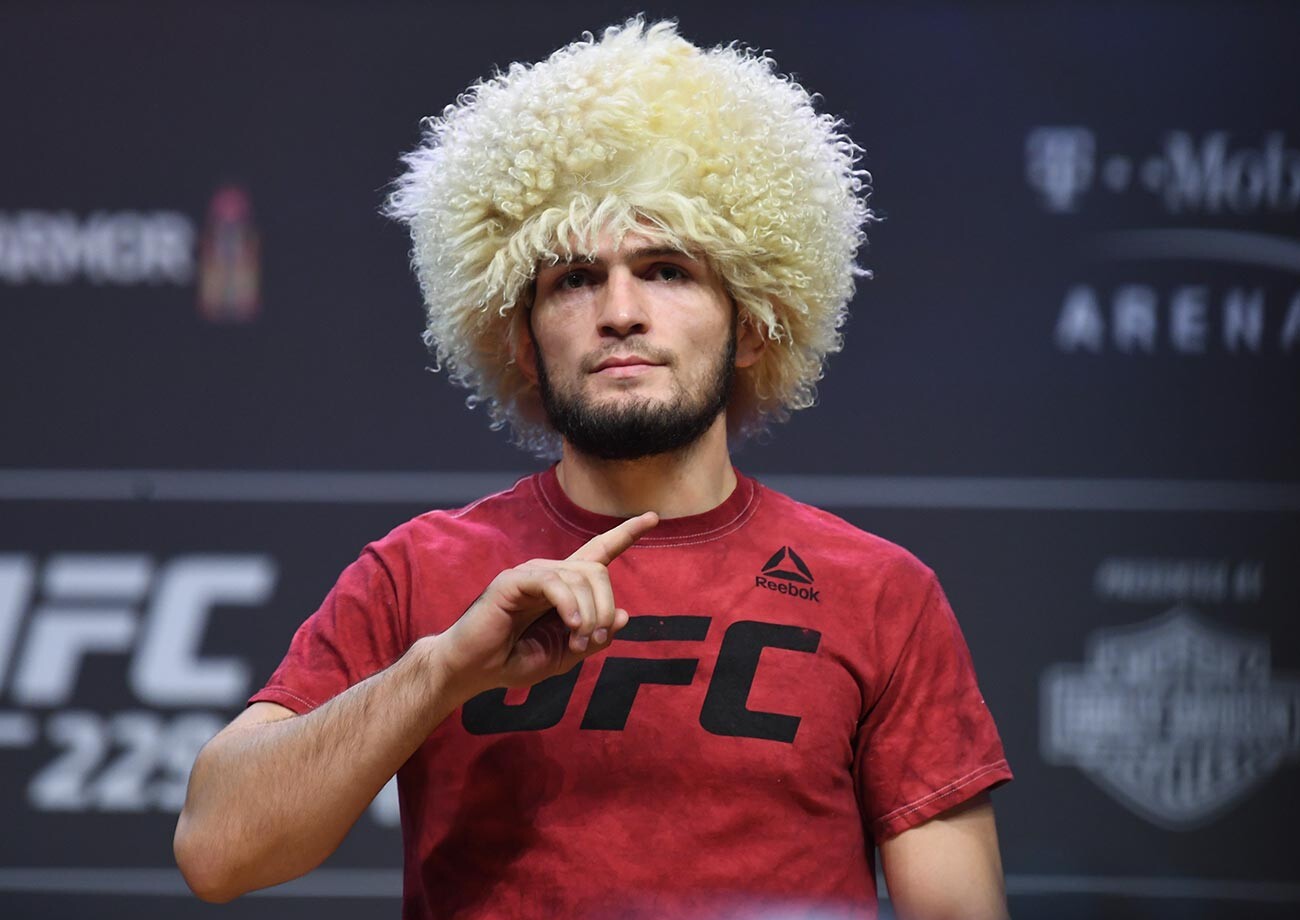 Khabib Nurmagomedov poses on the scale during the UFC 229 weigh-in  on October 5, 2018 in Las Vegas, Nevada