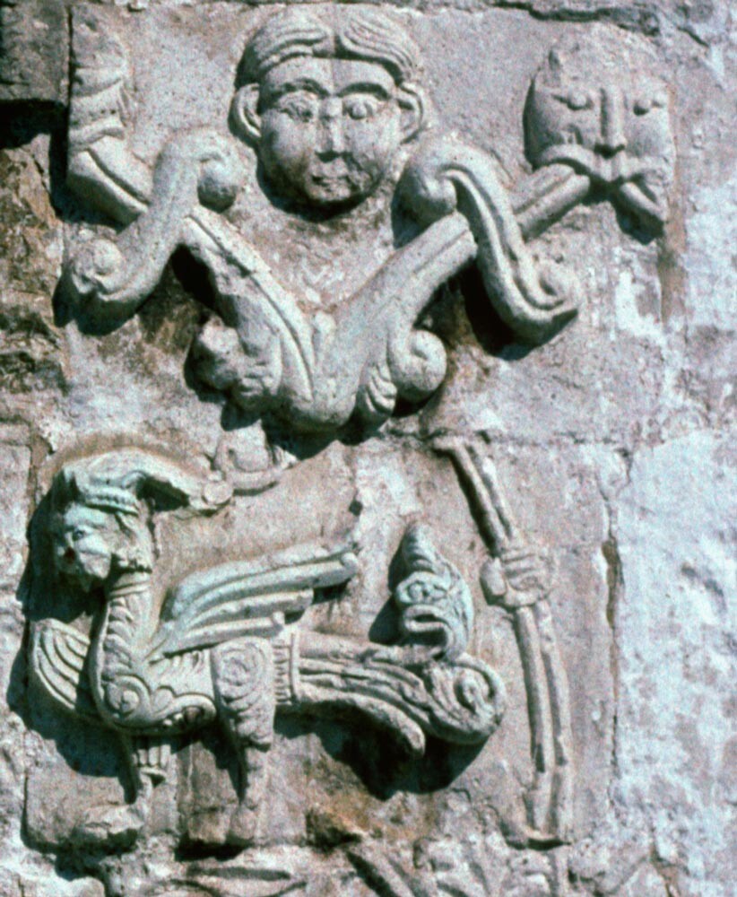 Cathedral of St. George. South facade, limestone carving. Carved masks & gryphon.  August 9, 1994