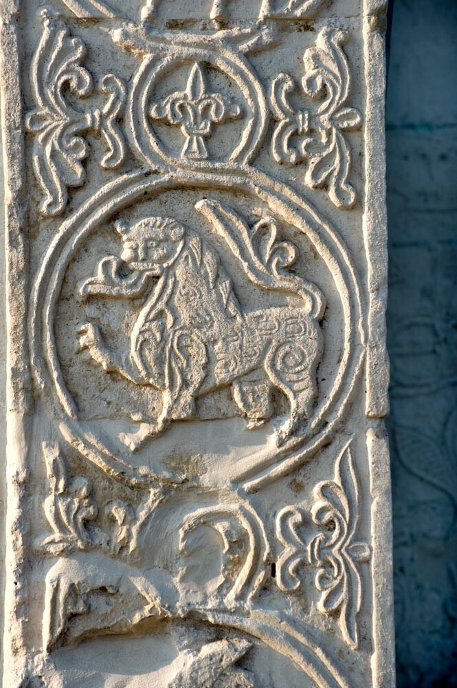 Cathedral of St. George. South porch, southeast corner with carved lion in strapwork. August 21, 2013