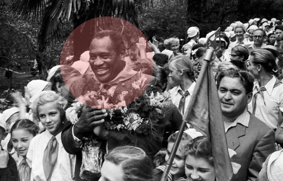 American singer Paul Robeson tours USSR in 1958, pictured with children at the Artek Pioneer Camp in Crimea