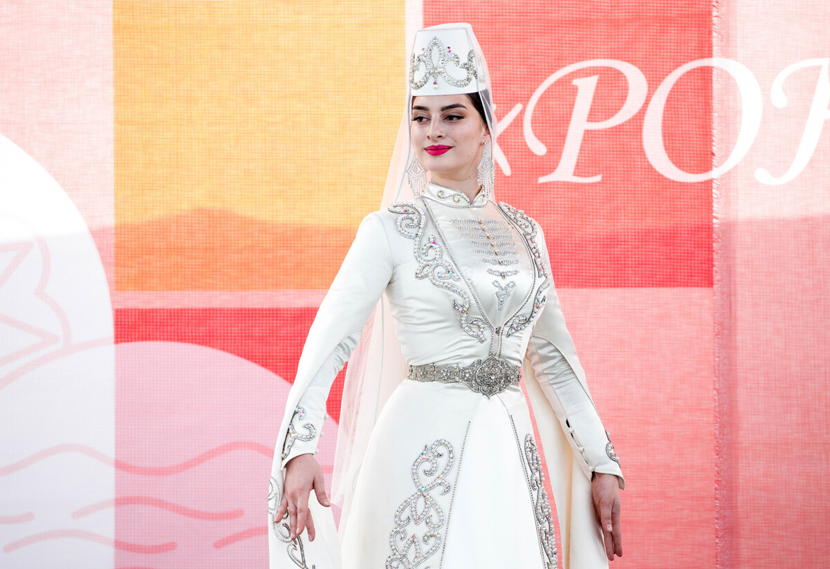 A young woman in a traditional dress in Vladikavkaz.