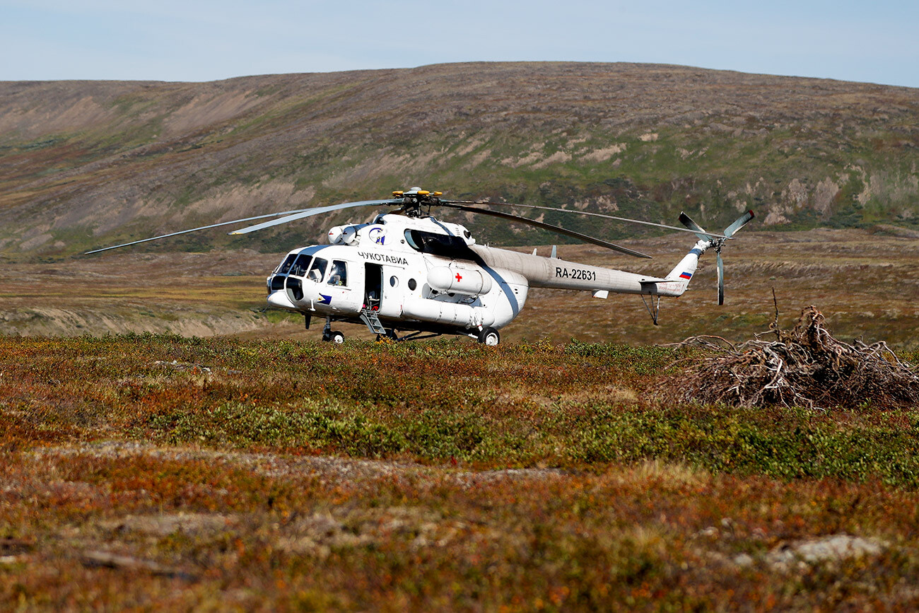 Chukotavia helicopter in the tundra.