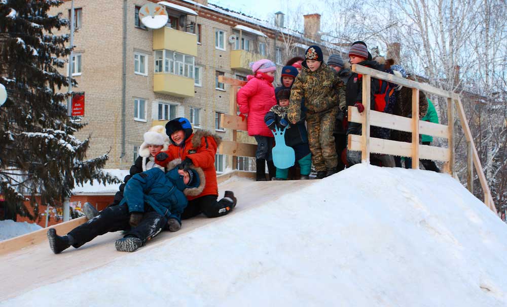 Snow sliding and ice sliding -- that's what makes kids happy during the winter time!