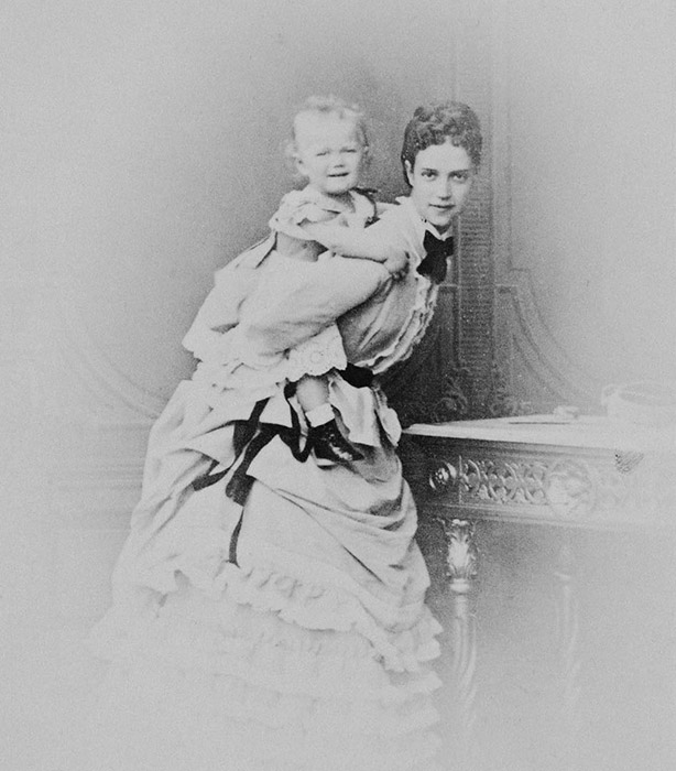 Maria Fyodorovna and Alexander III had a total of 6 children: their oldest son, Nikolai; Alexander, Grigory, Ksenia, Mikhail, and their youngest child, Olga. / Maria Fyodorovna with her son, Nikolai, who would become the last Romanov emperor