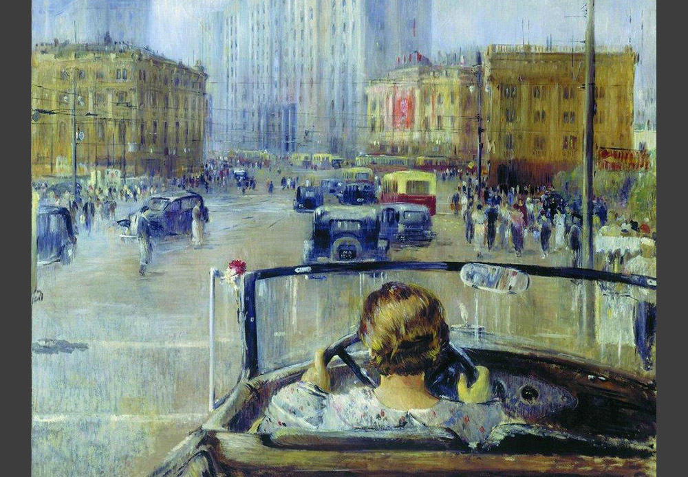 Au milieu des années 30, Youri Pimenov a débuté une série de toiles représentant Moscou, dont ce tableau fait partie. À l&#039;époque, il était plutôt rare de voir une femme au volant d&#039;une voiture. Aux yeux des contemporains de l&#039;artiste, cette image symbolisait une vie nouvelle et un Moscou nouveau. / Le Moscou nouveau, Youri Pimenov, 1937.