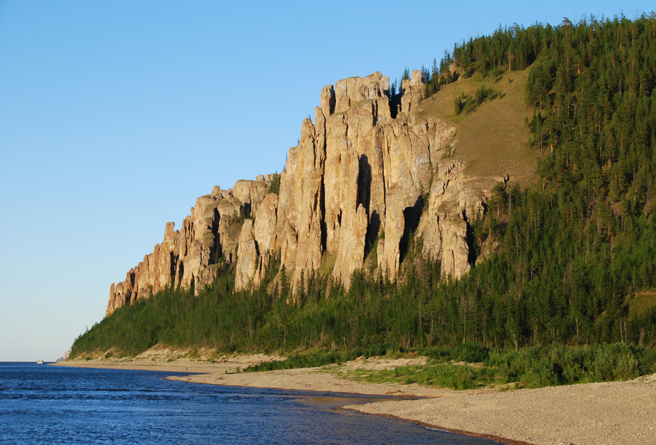 The Lena Pillars in Yakutia on the Sinyaya River. The rocky shores that make up the “Pillars” stretch here for dozens of kilometers. They reach 100 meters in height and create unbelievable views. The Pillars were formed out of limestone that was created approximately 550 million years ago. The pillars themselves are younger; they’re “only” about 400 thousand years old.