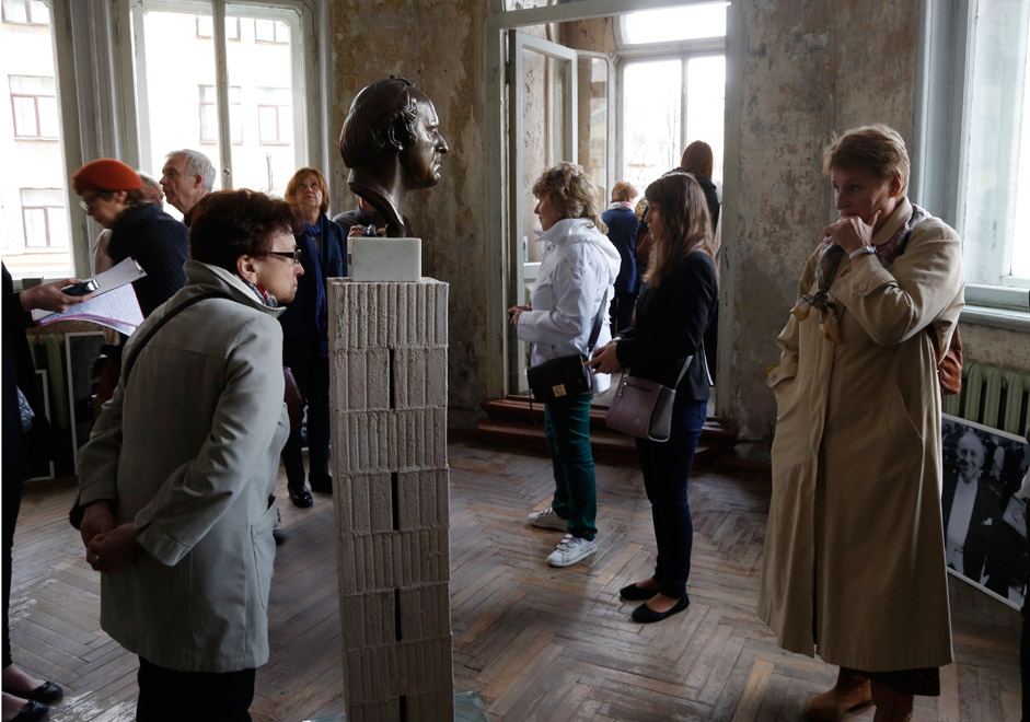 People visit the museum of the Nobel Prize winner and Soviet poet-dissident Joseph Brodsky in downtown St. Petersburg, May 24. The museum was open to the day of the poet's 75th anniversary of birth.