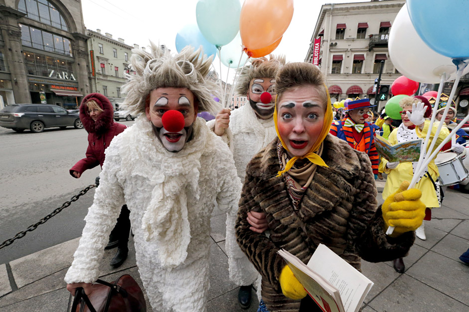 Actors of the clown-mime theater 'Mimigranty' celebrate the Humor Day in central St. Petersburg, Russia, 01 April 2015