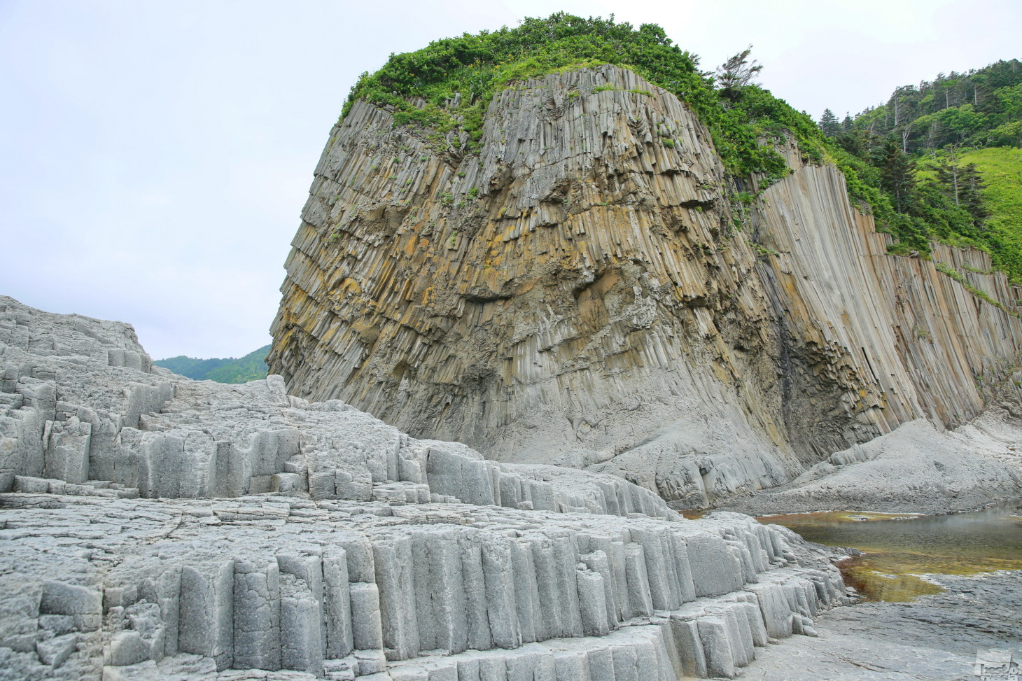 Cape Stolbchaty in the Kuril Islands. The natural columns resemble an amphitheater. 