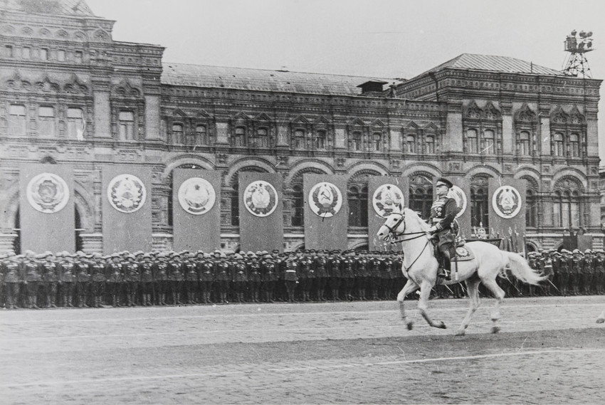 He continued working until his death, processing rolls of film in his own darkroom at home using equipment dating back to the war years.  / On the Parade Victory. George Zhukov reviews the troops, Moscow, 1945.