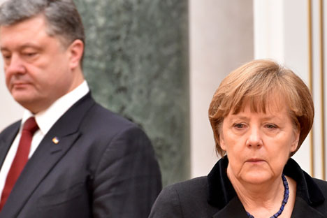 Angela Merkel junto al presidente ucraniano Petró Poroshenko.