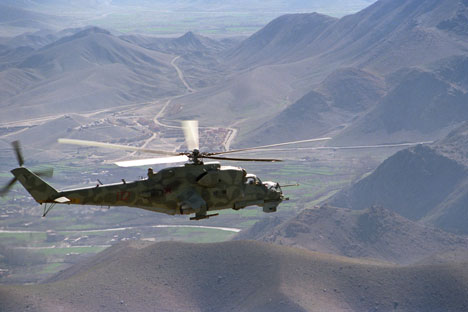 A Mi-24 helicopter on a mission in the vicinity of the Kabul-Herat road.