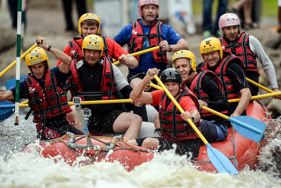 Russian Foreign Minister Sergei Lavrov (third from right) floated on rafts on the water route of the Regional Center for rowing slalom in Okulovka Novgorod region.