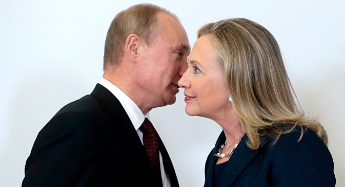 Vladimir Putin meets Hillary Clinton on her arrival at the APEC summit in Vladivostok, Sept. 8, 2012. Source: AP