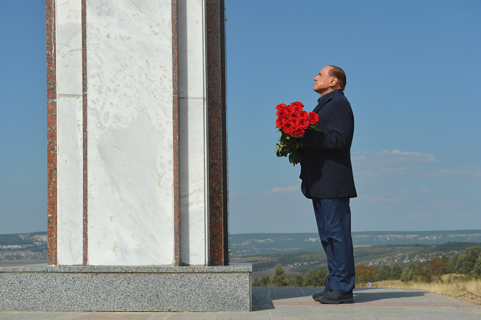 September 11, 2015. Italy's former Prime Minister Silvio Berlusconi lays flowers at the memorial to the soldiers from the Kingdom of Sardinia killed in the Crimean War, near Mount Gasfort in Crimea.
