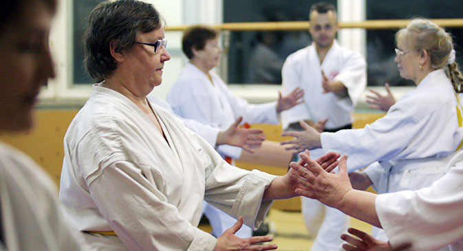 Elderly people at aikido training, Novosibirsk. Source: TASS / Alexei Fyodorov