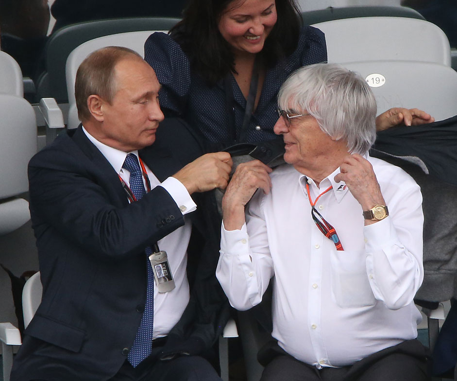 Russian President Vladimir Putin and F1 Supremo Bernie Ecclestone attend the Formula 1 Russian Grand Prix competition October 11, 2015 in Sochi