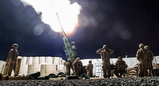 U.S. soldiers from the 3rd Cavalry Regiment take part in an artillery exercise on forward operating base Gamberi in the Laghman province of Afghanistan December 24, 2014