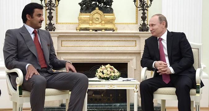 Russian President Vladimir Putin and Qatari Emir Tamim bin Hamad Al Thani.