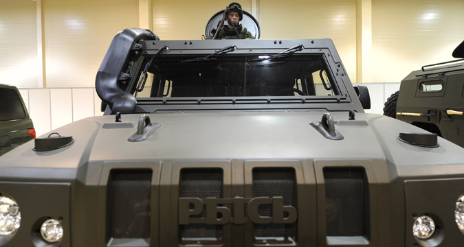 A serviceman in a light multirole armoured vehicle Lynx at the exhibition Innovations Day of the Southern Military District in Rostov-on-Don.