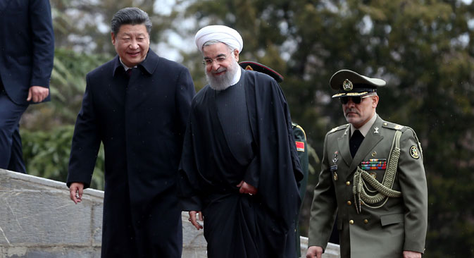 Chinese President Xi Jinping is welcomed by Iranian President Hassan Rouhani during his official arrival ceremony at the Saadabad Palace in Tehran, Iran.