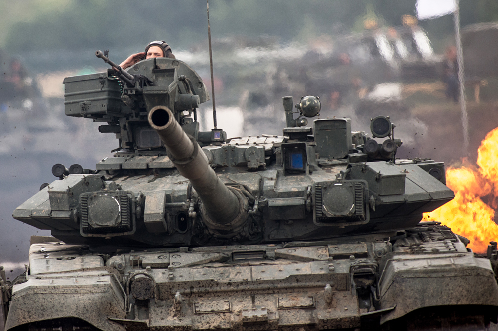 A T-90 tank participates in the specialized military equipment show held as part of the "Invincible and Legendary" military patriotic program during the Engineering Technologies 2014 international forum in Zhukovsky near Moscow.