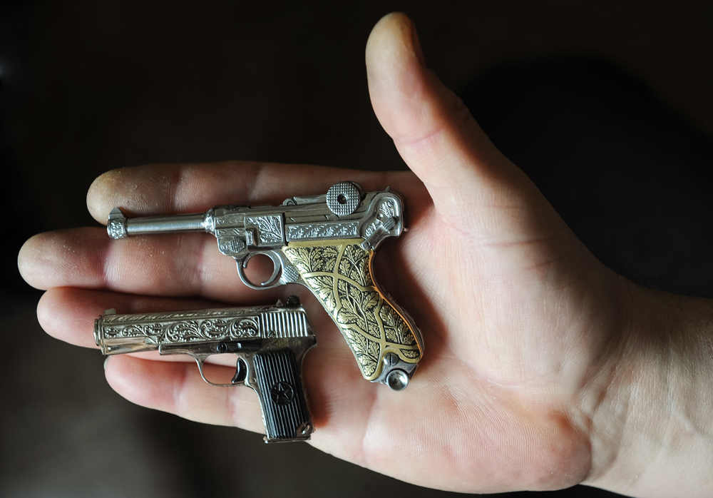 TULA, RUSSIA. FEBRUARY 8, 2016. Miniature replicas of pistols made by Tula craftsman Andrei Batashov