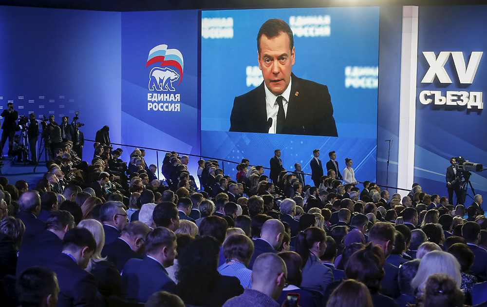Russian Prime Minister Dmitry Medvedev is seen on a screen as he speaks at a United Russia party congress in Moscow, Feb. 6, 2016