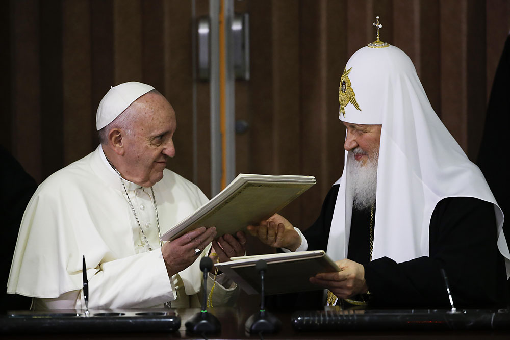 Pope Francis, left, and Russian Orthodox Patriarch Kirill exchange a joint declaration on religious unity in Havana, Cuba, 12, February 2016. Pope Francis and the leader of the Russian Orthodox Church, Patriarch Kirill, held a historic meeting in Havana's international airport. The two leaders signed a memorandum, which focused on ecumenism, or efforts to reunite Christian churches, common Christian values, and the persecution of Christians in the Middle East and Africa.
