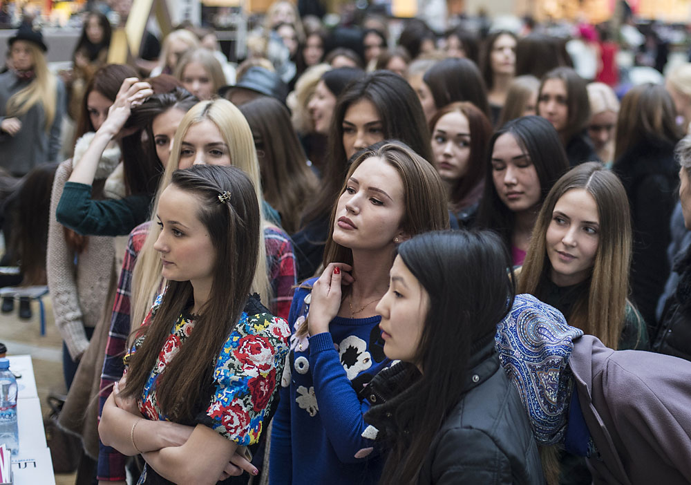Girls are seen here in the Afimall City retail and entertainment center at the open casting for the 2016 Miss Russia beauty pageant.