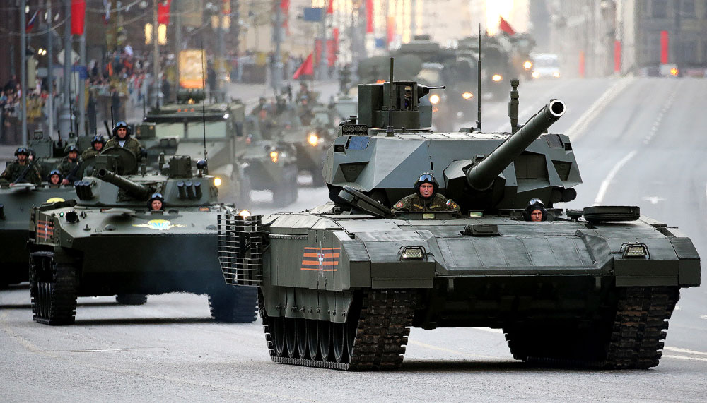 Armata battle tanks move along Tverskaya Street ahead of a Victory Day Parade rehearsal in Moscow's Red Square