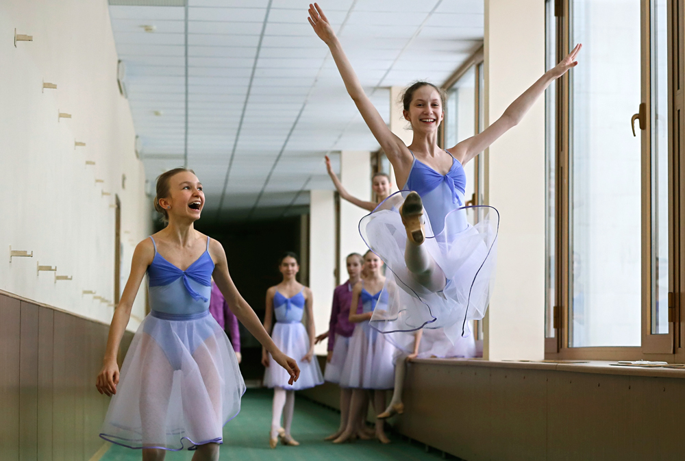 Students dance in the hallway during a break at Moscow State Academy of Choreography in Moscow, Russia. Moscow State Academy of Choreography is the oldest institution in Moscow which teaches Ballet arts not only Russian citizens, but also representatives from more than 20 countries.