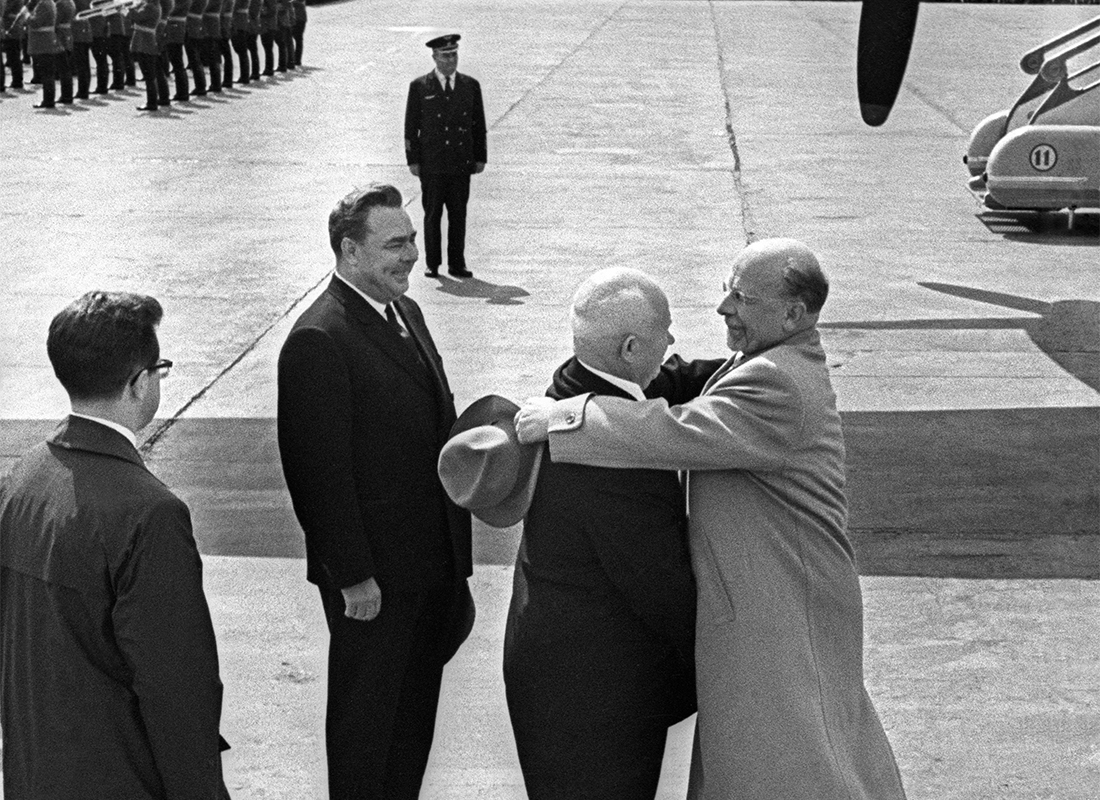 For half a century, Soviet and Russian photographer Yury Abramochkin was part of the so-called Kremlin pool of press photographers and traveled with his camera around the world. / Soviet head Nikita Khrushchev greets East German leader Walter Ulbricht as future USSR General Secretary Leonid Brezhnev looks on, 1962.