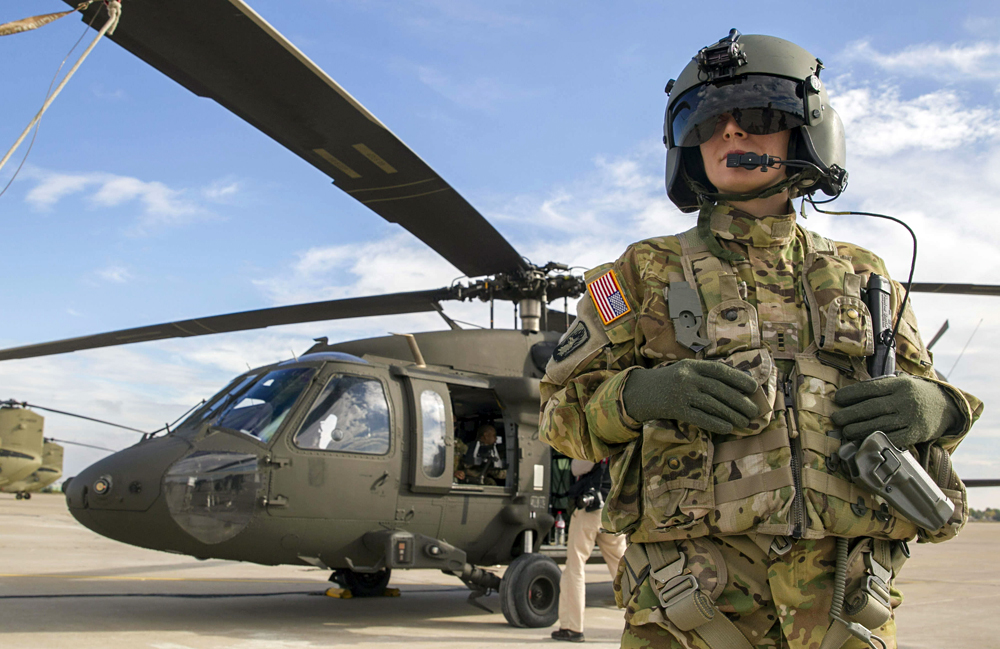  A U.S. Army Sikorsky UH-60 'Black Hawk' helicopter pilot waits in front of the helicopter at the air base in Zaragoza, northeastern Spain, October 27, 2015, during a NATO exercise 'Trident Juncture 2015'. 