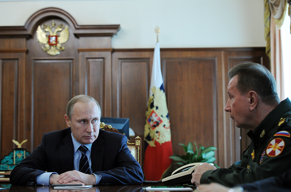 MOSCOW, RUSSIA. APRIL 5, 2016. Russia's President Vladimir Putin (L) and Russian Internal Troops commander Viktor Zolotov during a meeting at Moscow's Kremlin.