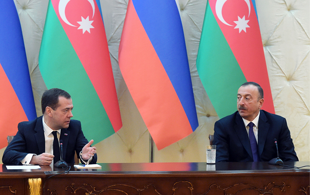 Russia's Prime Minister Dmitry Medvedev and Azerbaijan's President Ilham Aliyev give a joint press conference following their meeting, April 8. 